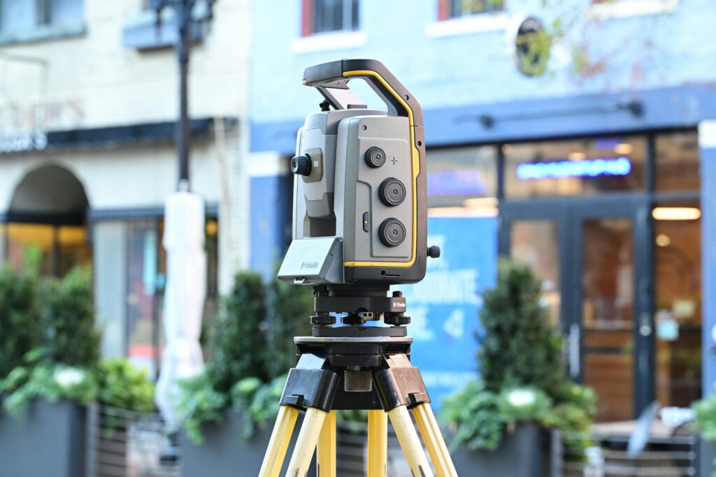 pexels-photo-29356756-29356756 Sophisticated surveying equipment on city street showcasing modern urban mapping technology.